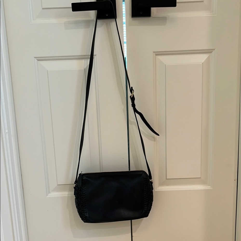 Cole Haan black woven cross body bag